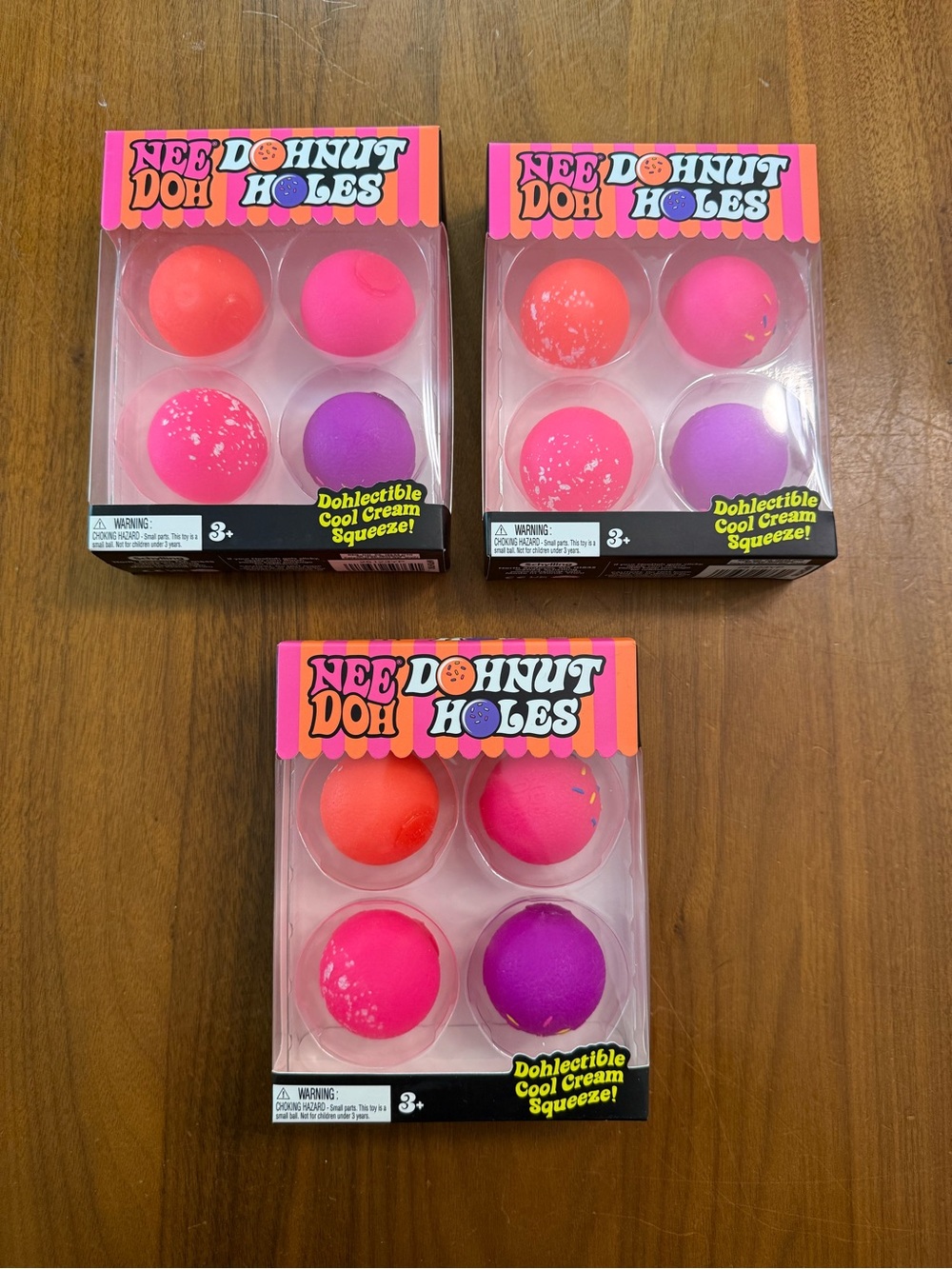 NeeDoh Donut Holes Squishy Set - Pink, Hot Pink, Purple, Coral